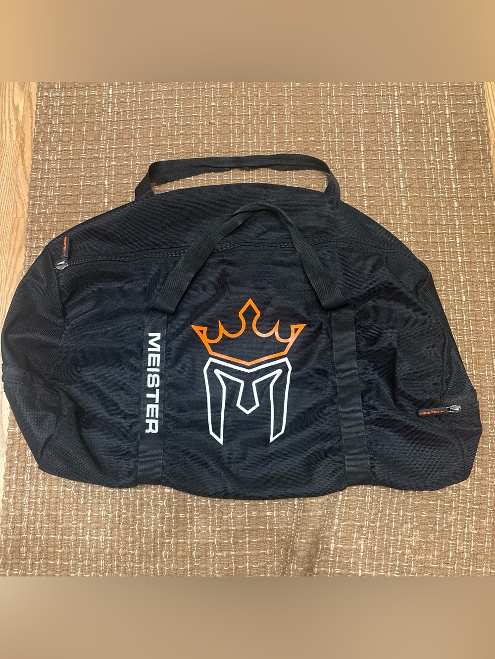 Meister Black Duffel Bag with Orange Accent